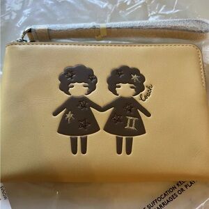 NWT Coach “Gemini” Leather Wristlet